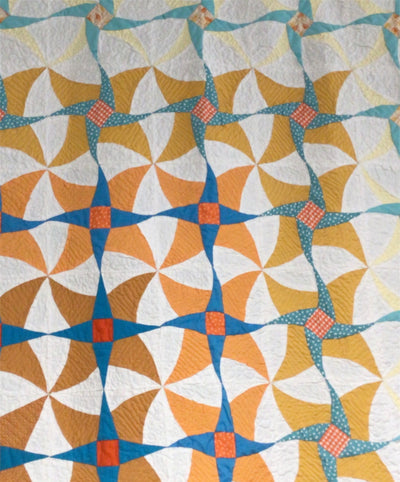 Quilt "Twisted Mariner's Compass" - A modern flair to a conventional quilting design.
